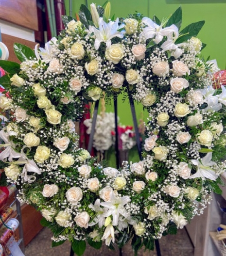 Corona de rosas blancas funeral