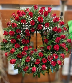 Corona de rosas rojas funeral